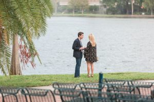 Surprise marriage proposal along the water at Lake Eola in downtown Orlando by the amphitheater