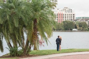 Surprise marriage proposal along the water at Lake Eola in downtown Orlando by the amphitheater