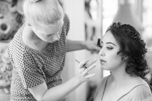Black and white image of Bride getting ready for her backyard wedding in Kissimmee Florida