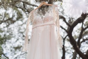Lace wedding dress with sleeves from Orlando dress shop for intimate Kissimmee wedding day