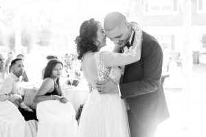 Bride and groom share their first dance during their intimate outdoor wedding reception in Kissimmee captured by Orlando photographer