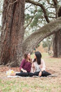 Romantic surprise marriage proposal at a park in downtown Orlando captured by top engagement photographer in Orlando, Florida