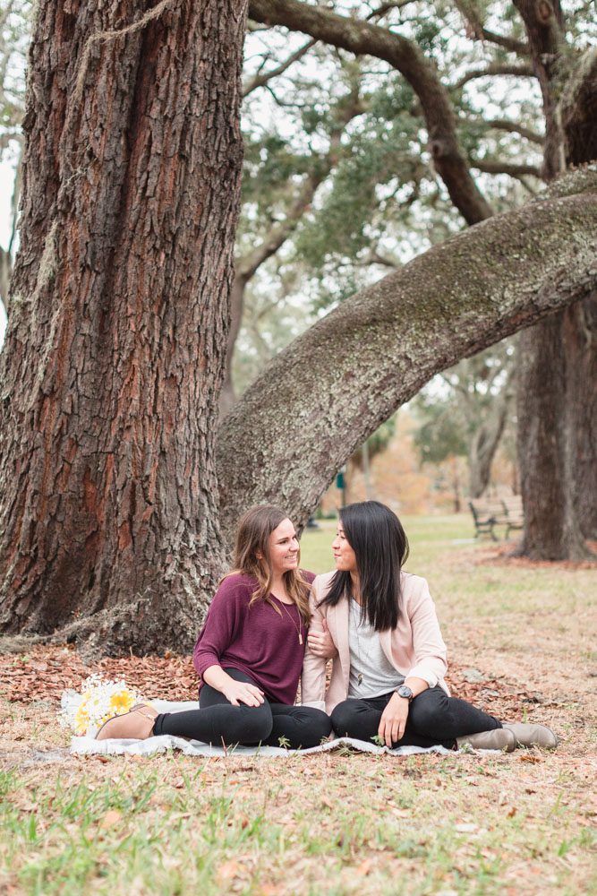 Romantic surprise marriage proposal at a park in downtown Orlando captured by top engagement photographer in Orlando, Florida