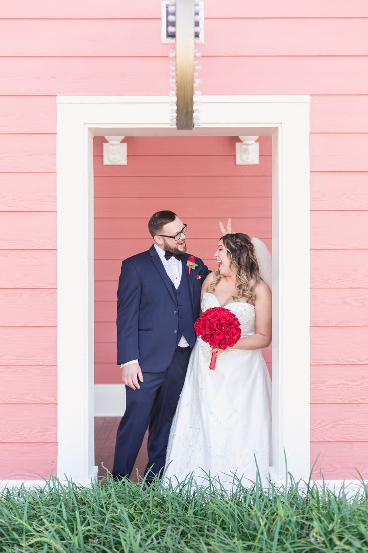 Orlando wedding photographer captures fun and romantic photos of the bride and groom during their Disney wedding day at the Boardwalk Inn Resort