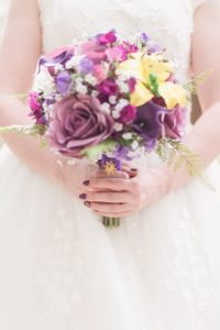 Purple and yellow tangled themed wedding bouquet for a sweet Disney themed wedding at Cypress Grove Park in Orlando, Florida