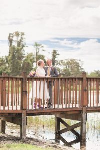 Orlando wedding photographer captures portraits of the newlyweds at Cypress Grove Estate House Park in Central Florida