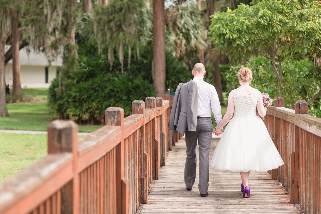 Romantic and candid photography at Cypress Grove Park after an intimate wedding ceremony by top Orlando wedding photographer