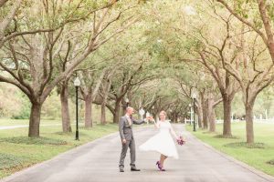 Bride and groom surrounded by gorgeous Cypress trees at this incredible park venue in Orlando, Florida during their intimate wedding day