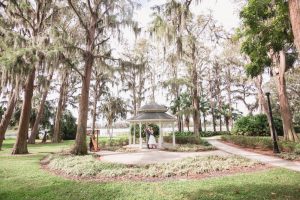 Orlando wedding photography and videography team capture romantic intimate wedding at a gazebo in Cypress Grove Park in Orlando