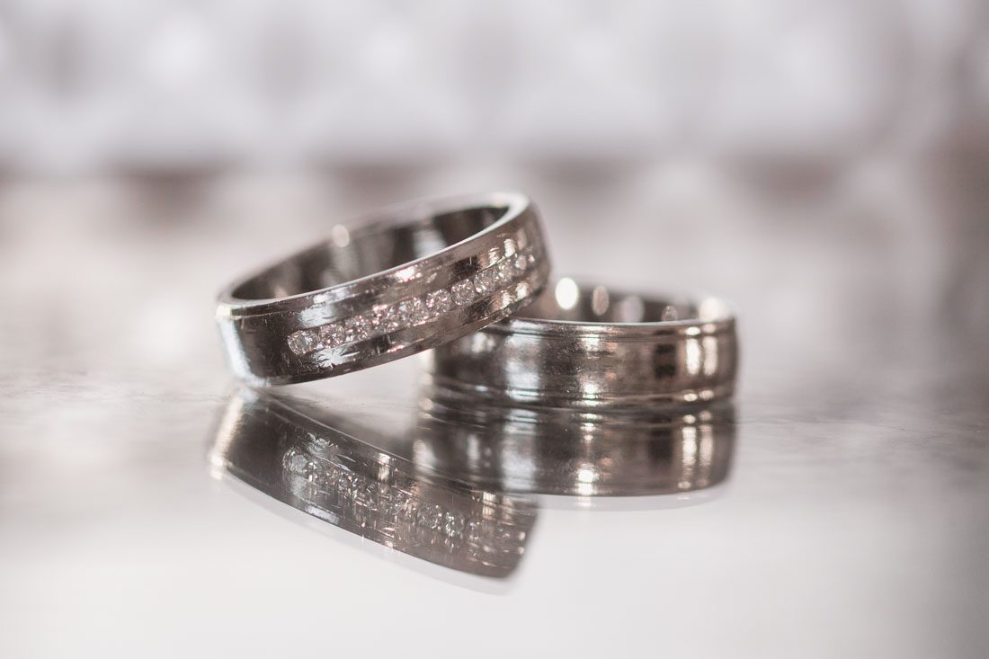 Close up photo of the wedding bands for a gay wedding in Orlando at the Cypress Grove Estate House by top Orlando photographers