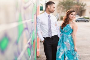 Urban hipster engagement session with graffiti mural walls captured by top Orlando wedding and engagement photographer
