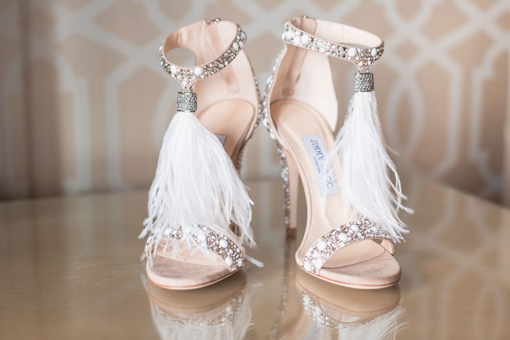 Bride's feather and glitter Jimmy Choo heels for her wedding at the Four Seasons in Orlando FL