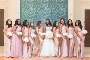 Bridesmaids pose for a fun and sassy photo at the Four Seasons captured by top Orlando wedding photographer