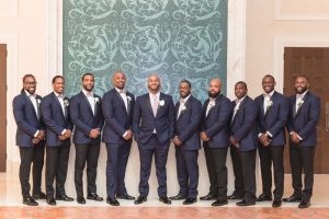 Groomsmen portrait captured at the Four Seasons by top wedding photographer in Orlando