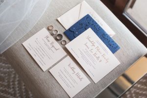 Invitation suite with navy blue and cream for a wedding at the Four Seasons captured by top Orlando wedding photographer and videographer