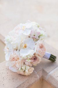 Bridal bouquet with orchids and other white and blush pink flowers for a Four Seasons wedding in Orlando