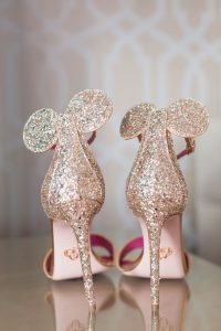 Mickey mouse themed glitter wedding shoes with I Do written underneath captured by Orlando photography team