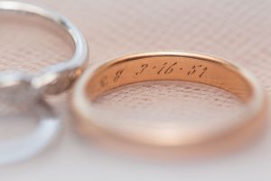 Close up of engraving on vintage wedding band captured by top Orlando wedding photographer