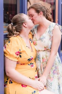 Same-sex engagement photography at world showcase in Epcot captured by top Orlando LGBT photographer