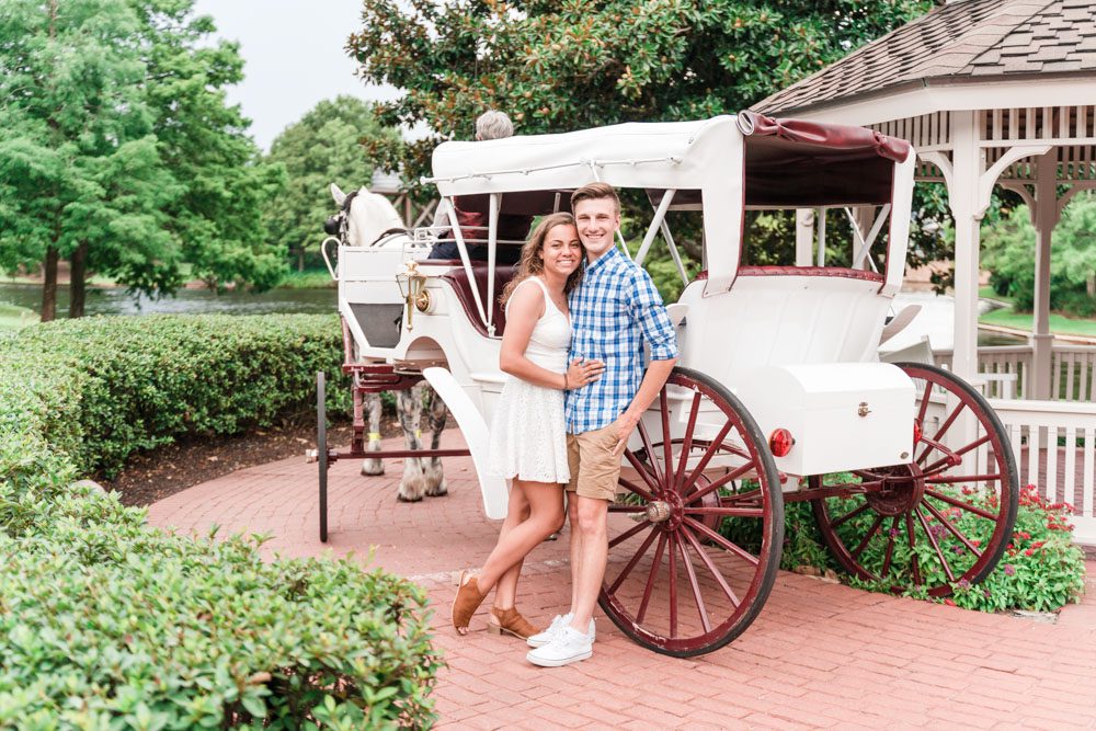 Orlando Engagement photography session at Disney Port Orleans Riverside with a horse and carriage 
