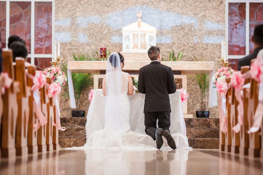 Catholic Vietnamese wedding ceremony in Oklahoma City captured by traveling wedding photographers from Orlando