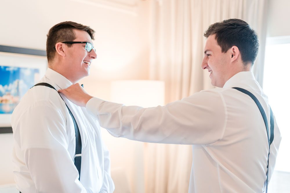 Groom getting ready with his groomsman captured by best Orlando wedding photography team