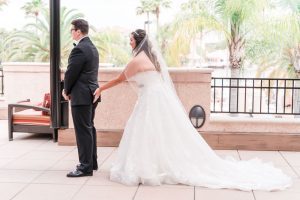 Funny First look between a bride and groom captured by top Orlando wedding photographer