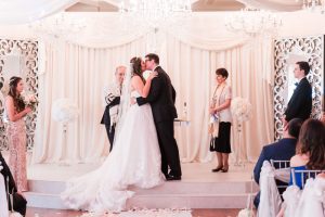 Wedding ceremony at the Crystal Ballroom Veranda in Orlando captured by top wedding photographer and videographer