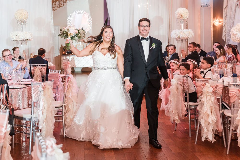 Bride and groom at their wedding reception at the Crystal Ballroom captured by Orlando wedding photographer and videographer