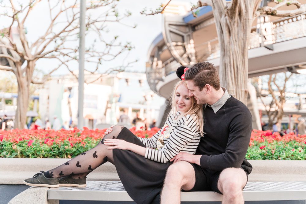 Engagement session photo in Tomorrowland at Magic Kingdom in Orlando Florida