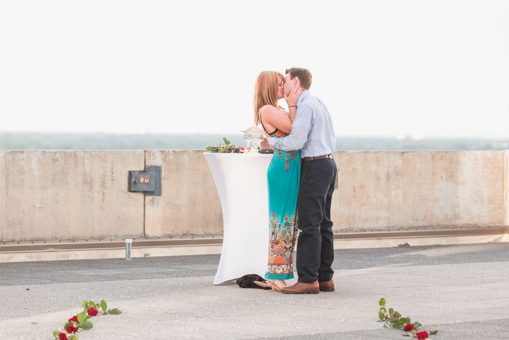 The Balcony rooftop venue in Orlando hosts a beautiful surprise proposal and engagement photography session at Sunset