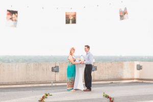 Orlando engagement photographer captures surprise proposal at The Balcony in downtown with skyline views at sunset