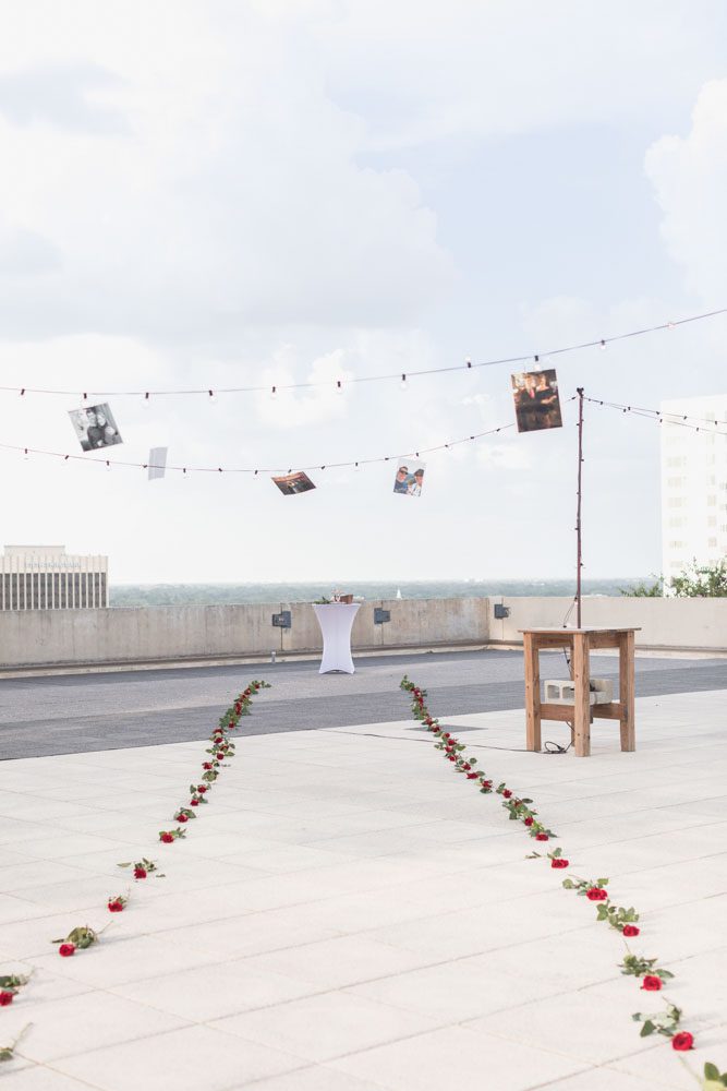 The Balcony rooftop venue in Orlando hosts a beautiful surprise proposal and engagement photography session at Sunset