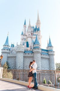 Engagement photo in front of the castle at Magic Kingdom in Orlando