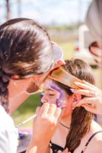 Facepainting at a kids birthday party in Orlando captured by top event photographer and videographer