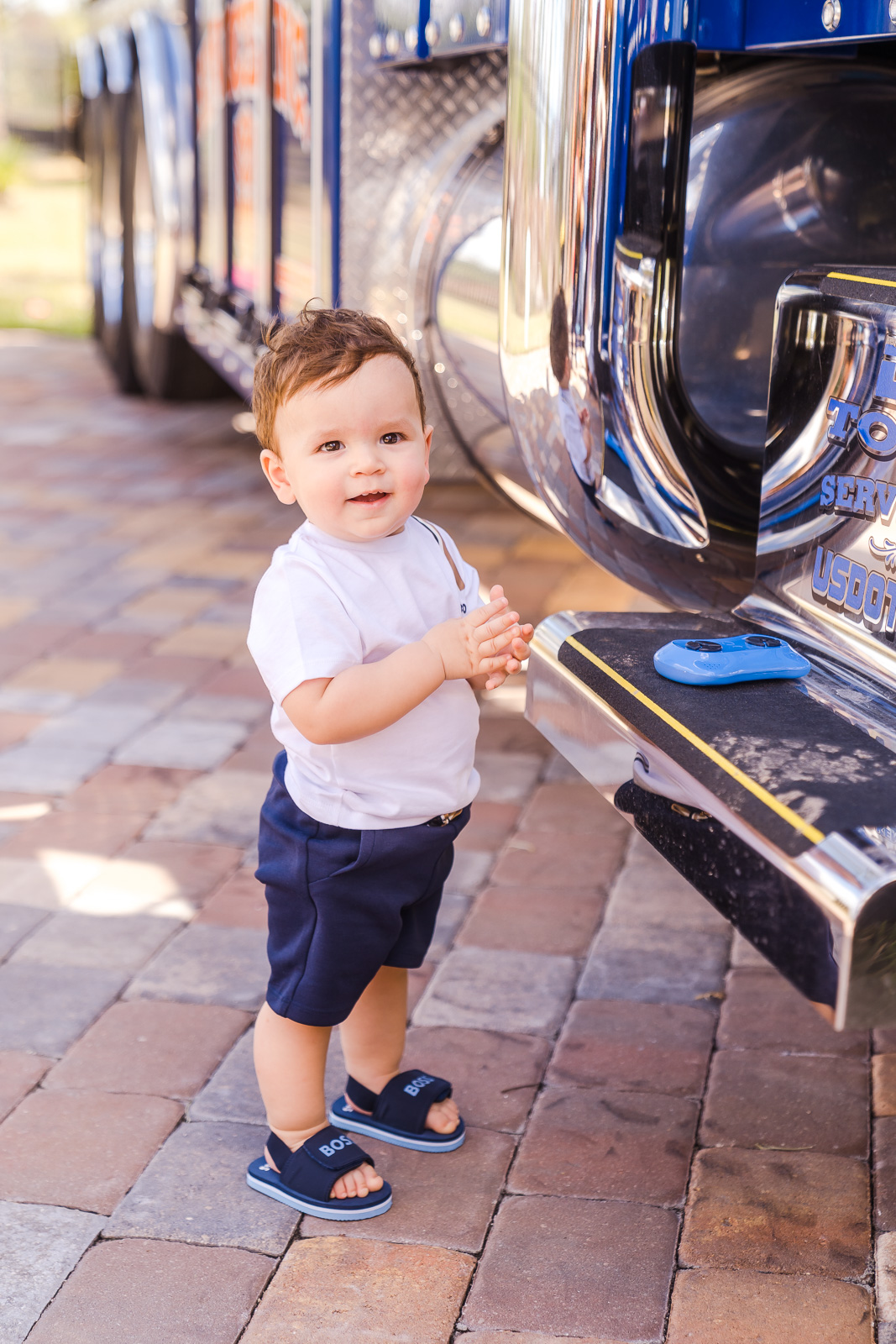 Birthday portrait in front of truck during first birthday event in Orlando Florida