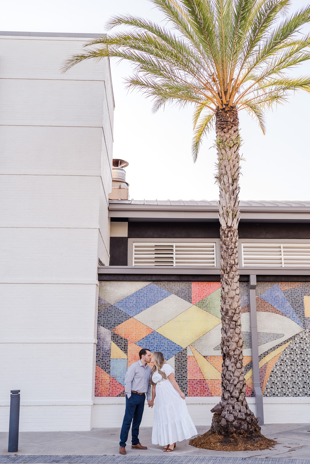 Colorful mosaic wall in Lake Nona for fun Orlando engagement session location