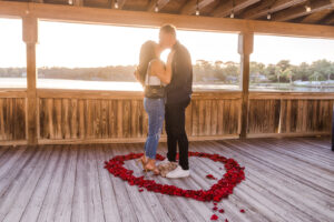 Surprise proposal photographer in Orlando captures engagement at Enzo's on the Lake in central Florida