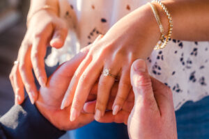 Close up of engagement ring during surprise proposal at Enzo's on the Lake in Orlando