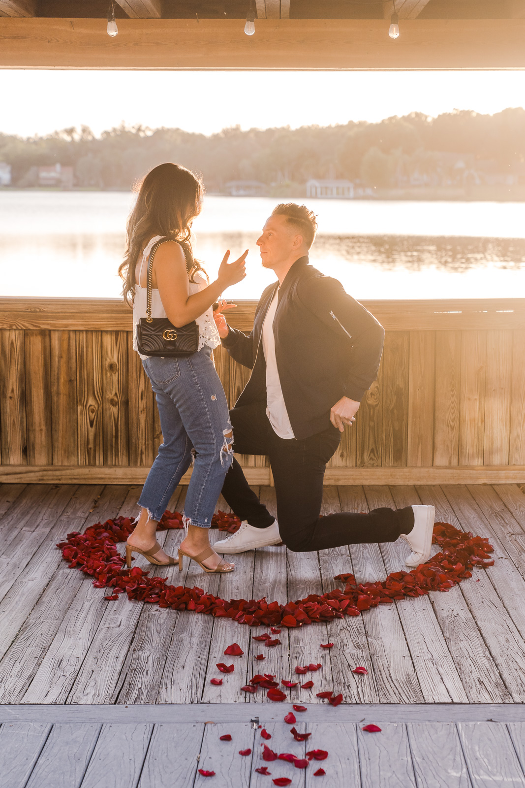 Surprise proposal photography at Enzo's on the Lake in Orlando, Florida