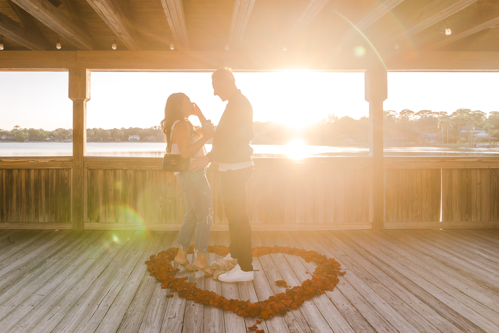 Waterfront sunset location to propose at in Orlando captured by top Engagement photographer Elle