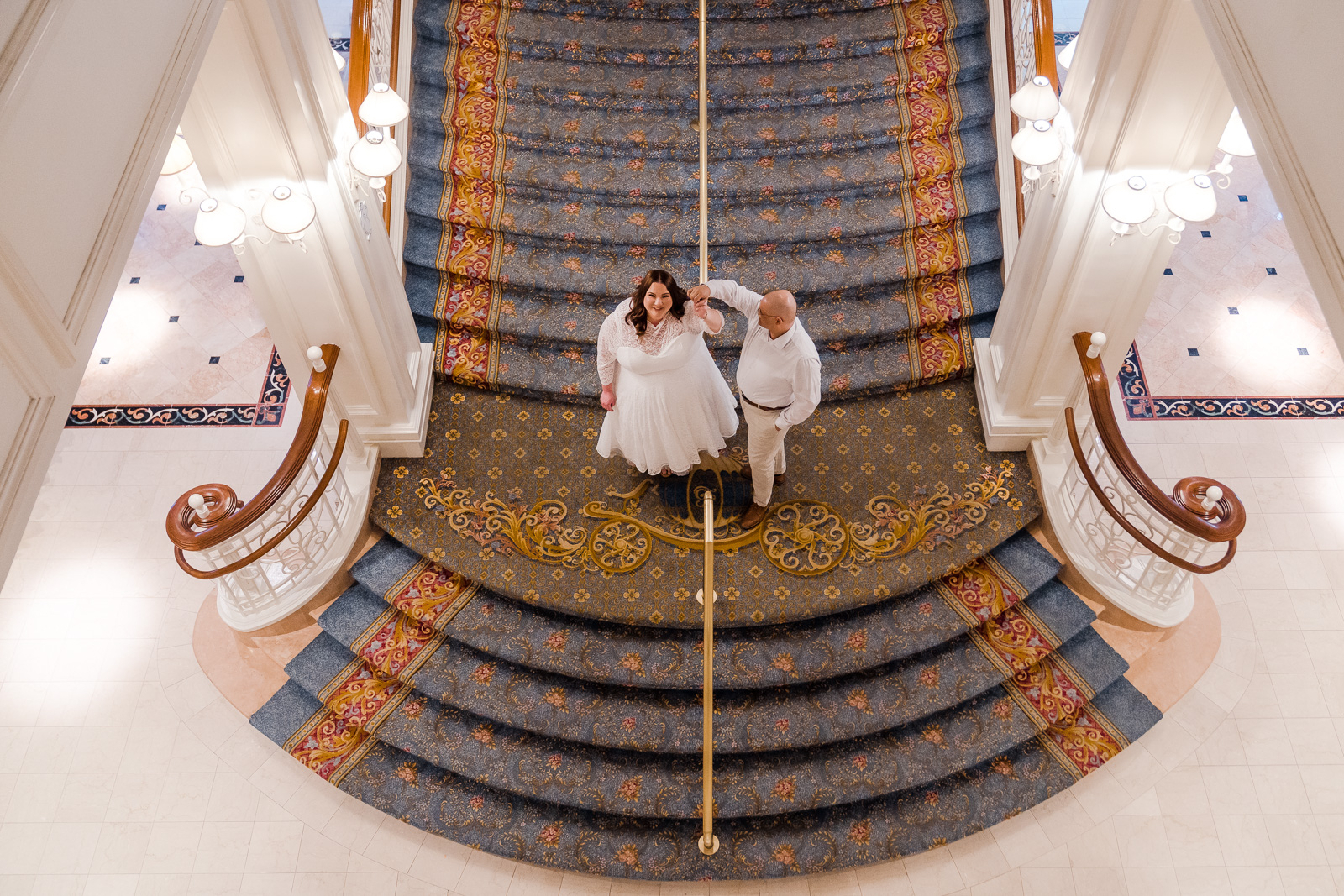 Engagement photography at staircase of Disney's Grand Floridian resort in Orlando