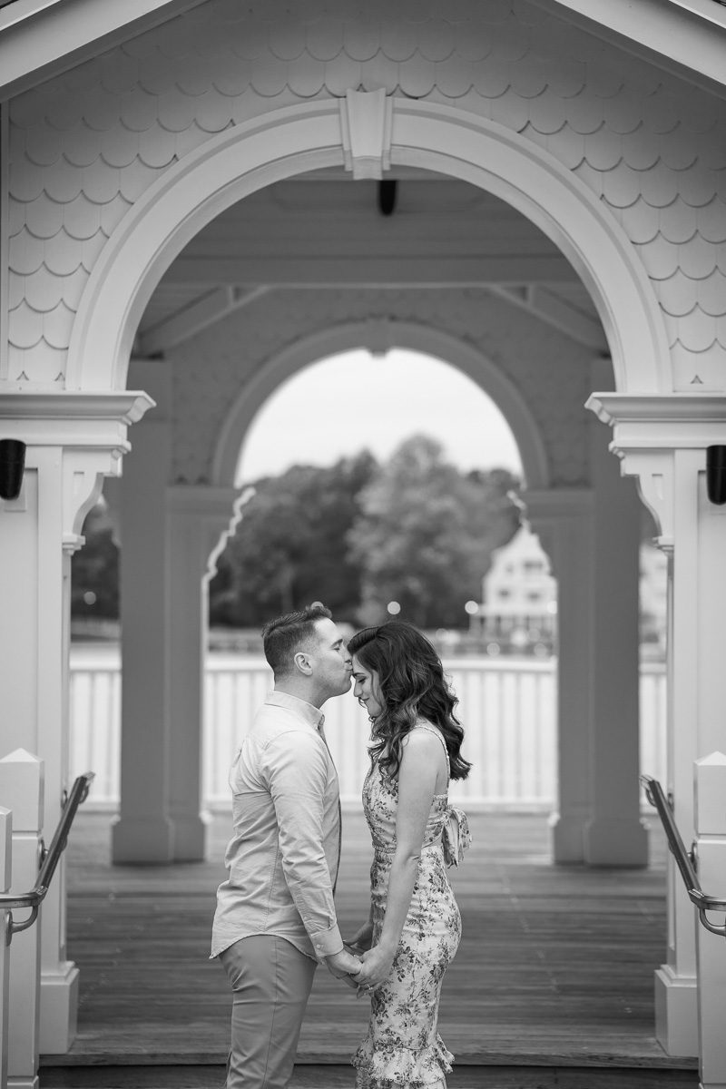 Black and white portrait from romantic engagement session at Disney's Boardwalk Inn Sea Breeze Point Orlando