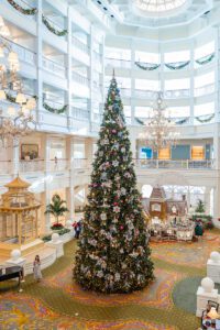 Christmas at the Grand Floridian Resort in Disney World for a whimsical wedding with top Orlando photographer and videographer