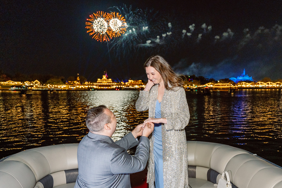 Orlando proposal photographer captures engagement on fireworks boat cruise at night