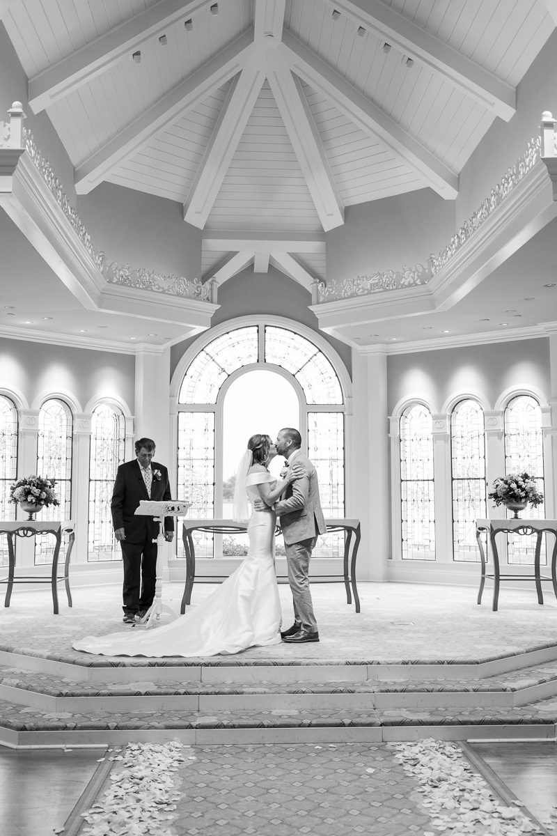 Top Disney wedding photographer captures first kiss at the Wedding Pavilion Grand Floridian Resort in Orlando