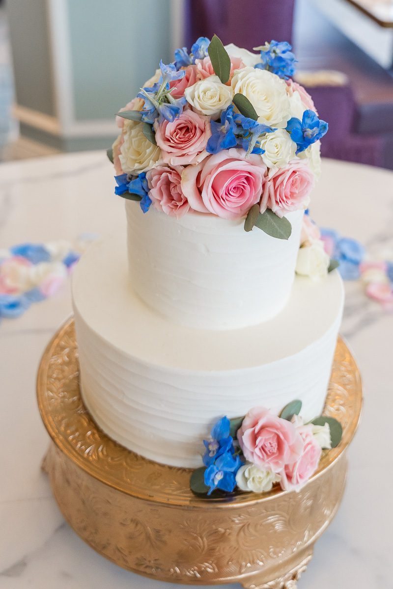 Pink and blue wedding cake for Citricos reception at Grand Floridian