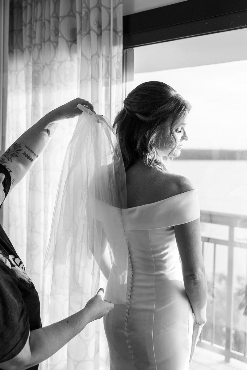Elegant black and white photo of Disney bride on her wedding day at the Contemporary Resort in Orlando Florida
