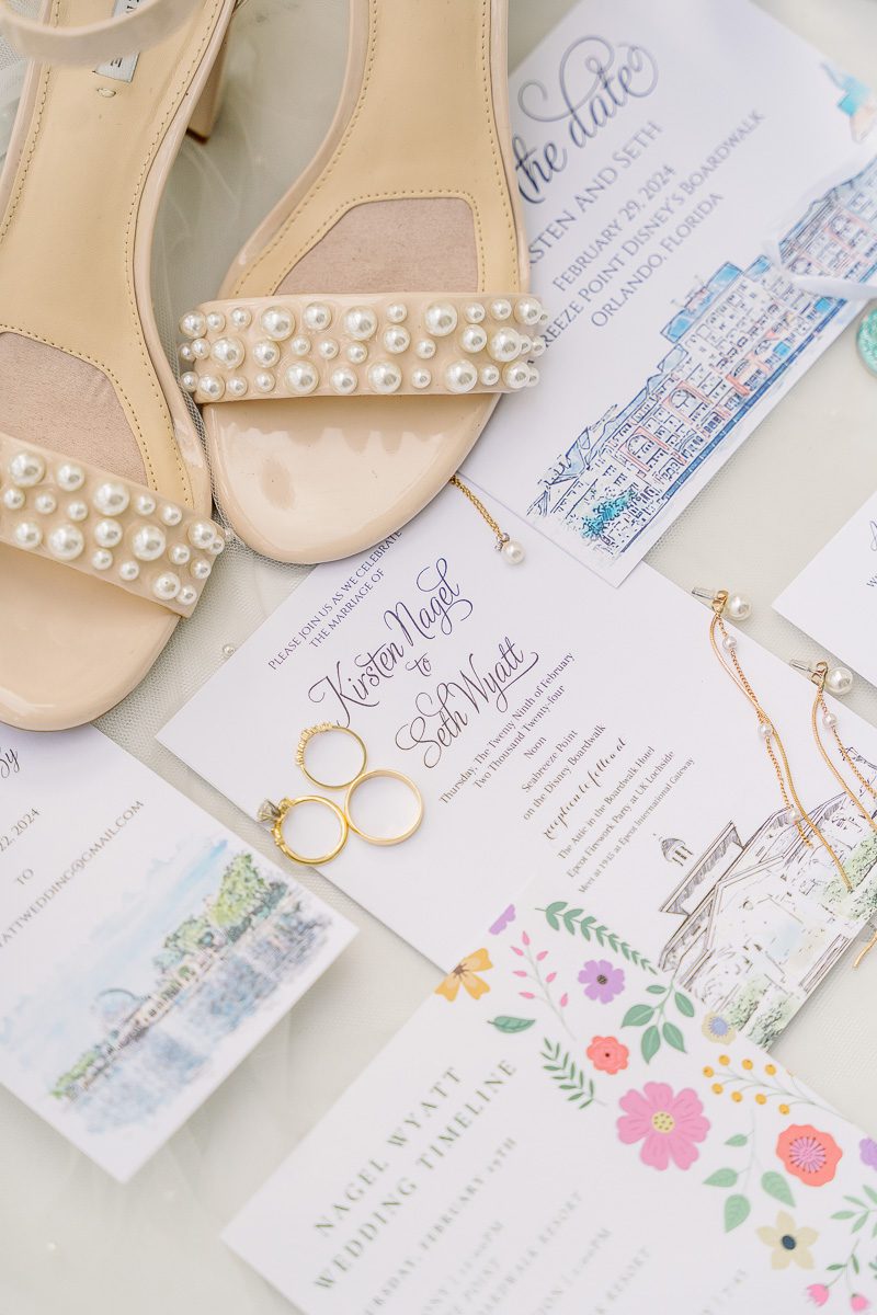 Invitations and bridal details for Disney wedding at the Boardwalk Inn Orlando Florida by top Disney wedding photographer