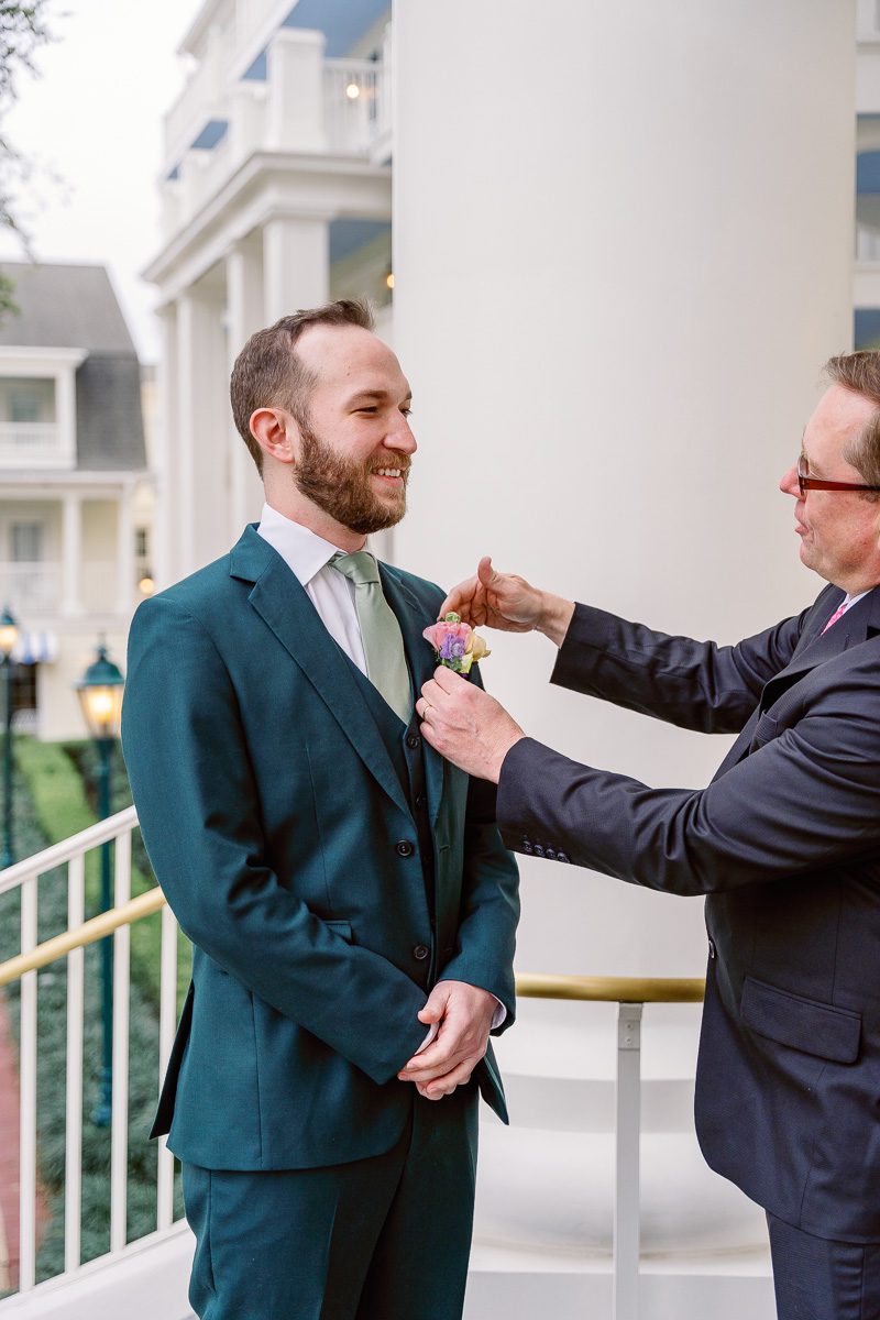 Groom gets ready for Disney wedding at Boardwalk Inn with top Orlando photographer and videographer
